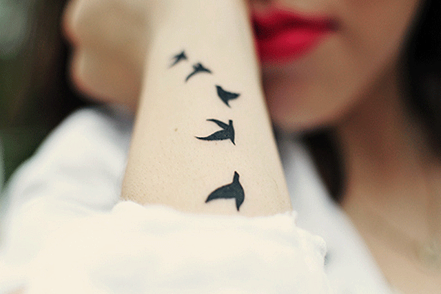 pajaros volando tatuaje